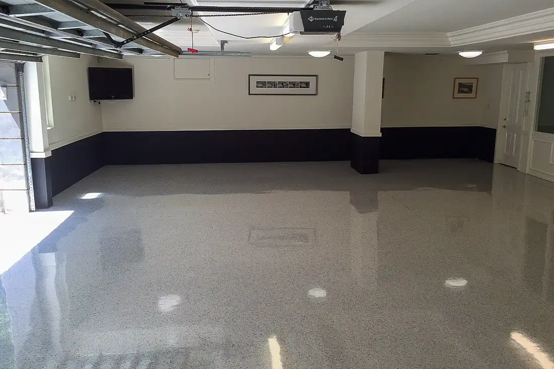 garage epoxy floor shining in garage with open door
